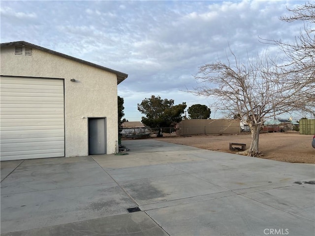 exterior space with a garage