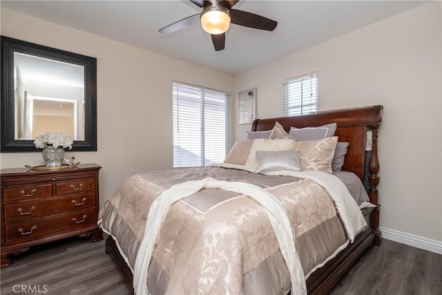 bedroom featuring dark wood-type flooring and ceiling fan