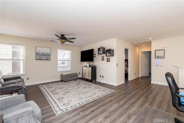 living room with hardwood / wood-style floors and ceiling fan