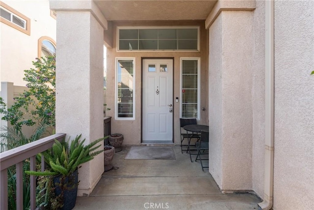 doorway to property featuring a balcony