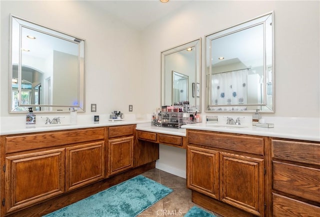 bathroom featuring vanity and tile patterned flooring