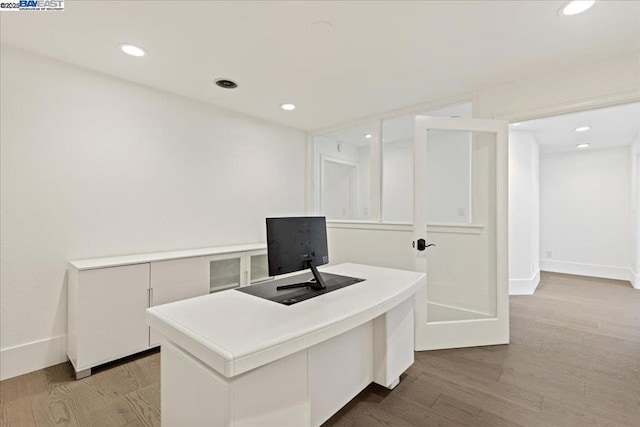 office area with light wood-type flooring