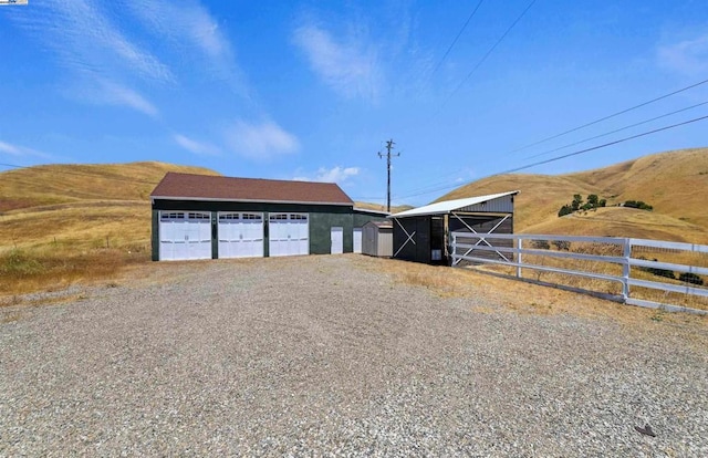 exterior space featuring a mountain view and a rural view