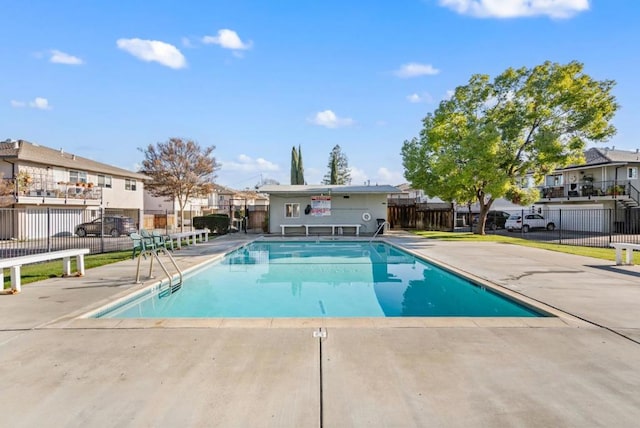 view of swimming pool featuring a patio