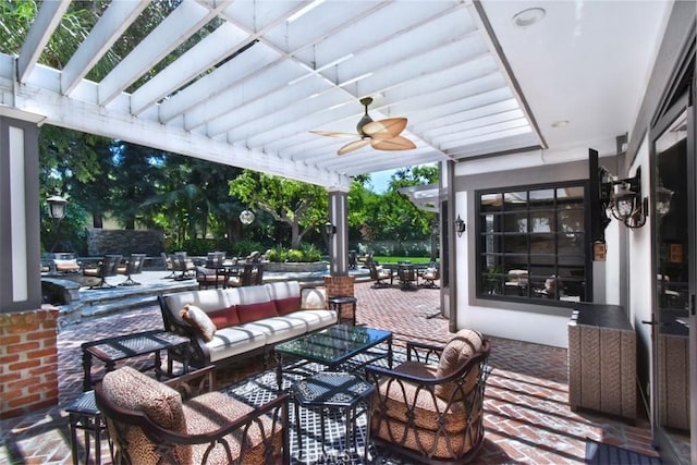 view of patio with ceiling fan, an outdoor living space, and a pergola