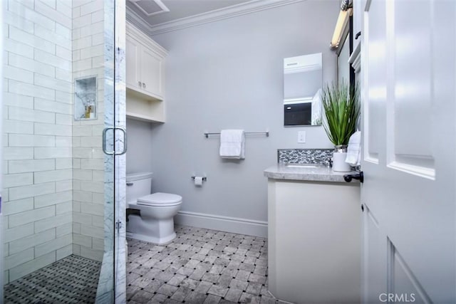 bathroom with crown molding, vanity, toilet, and a shower with door