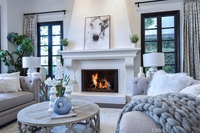 20514 Chatsboro Dr, Woodland Hills, CA 91364 - living area featuring a lit fireplace, plenty of natural light, and wood finished floors
