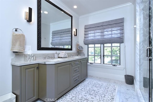 bathroom featuring crown molding, vanity, and a shower with shower door