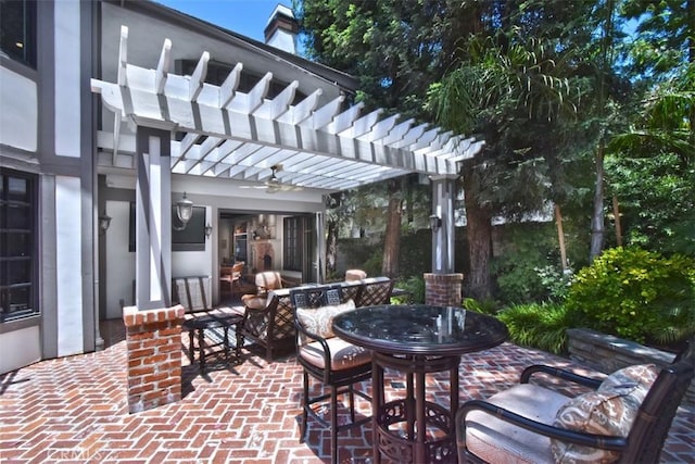 view of patio featuring a pergola