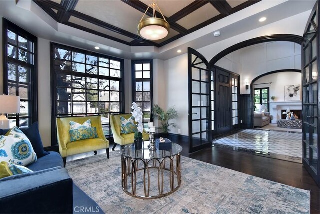 20514 Chatsboro Dr, Woodland Hills, CA 91364 - foyer entrance featuring wood finished floors, coffered ceiling, french doors, recessed lighting, and a fireplace