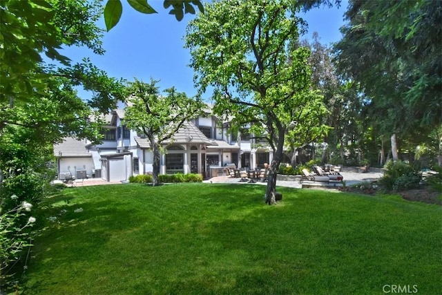 20514 Chatsboro Dr, Woodland Hills, CA 91364 - view of green lawn with a patio