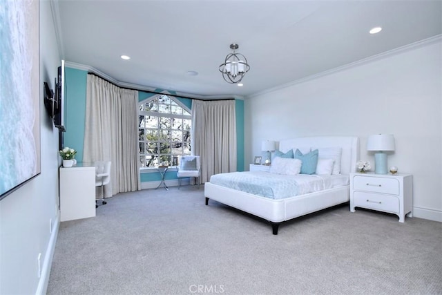 carpeted bedroom featuring crown molding and a chandelier