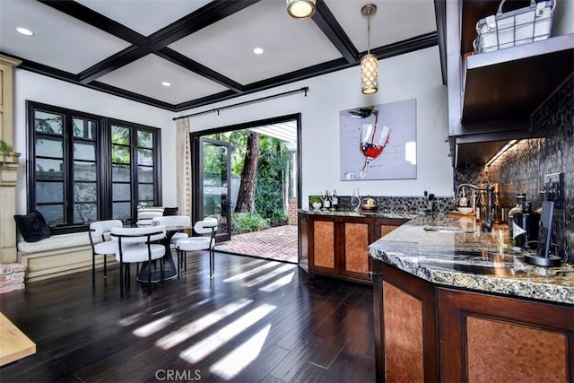 interior space featuring coffered ceiling, sink, tasteful backsplash, dark hardwood / wood-style floors, and beam ceiling