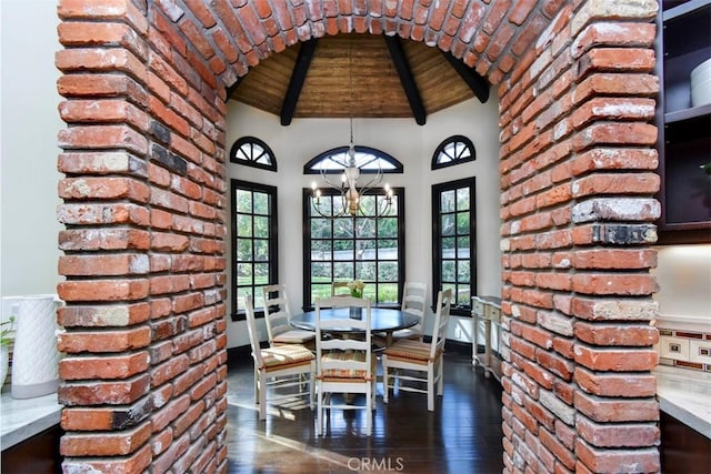 unfurnished dining area featuring wood ceiling, high vaulted ceiling, dark hardwood / wood-style flooring, a notable chandelier, and beam ceiling