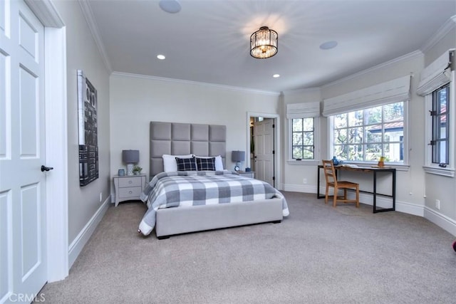 bedroom with crown molding and carpet flooring