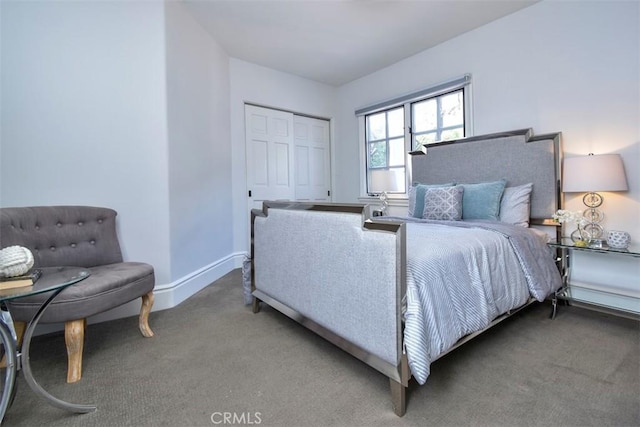 carpeted bedroom featuring a closet