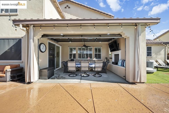 back of property featuring a patio area