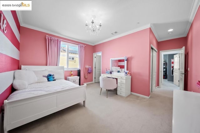 carpeted bedroom with crown molding and an inviting chandelier