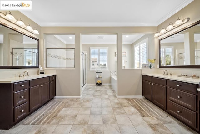 bathroom featuring vanity, tile patterned flooring, crown molding, and independent shower and bath