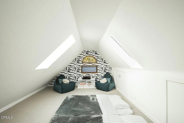 bonus room with carpet floors and lofted ceiling with skylight