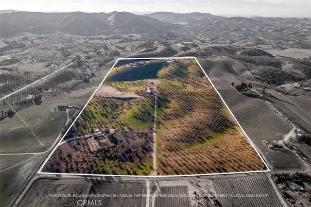 aerial view featuring a mountain view