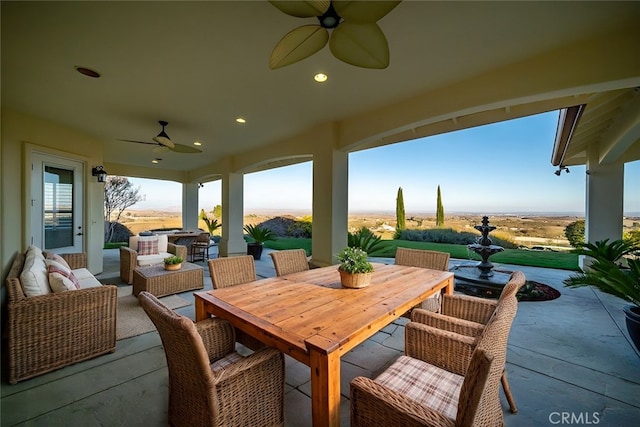 view of patio with an outdoor hangout area and ceiling fan