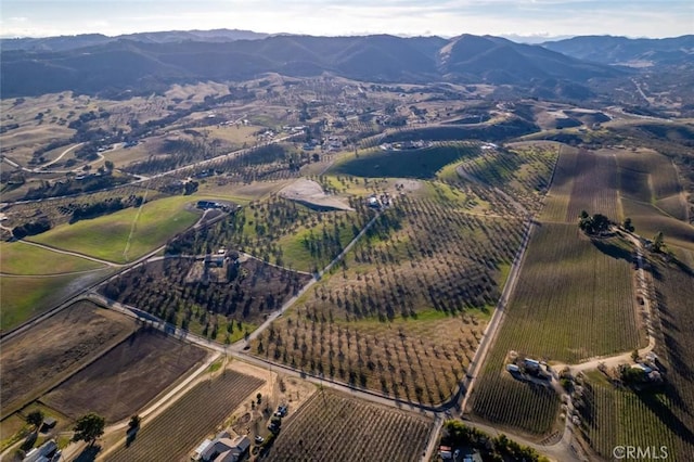 aerial view with a mountain view and a rural view