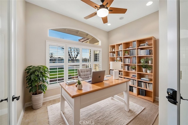 office space featuring ceiling fan