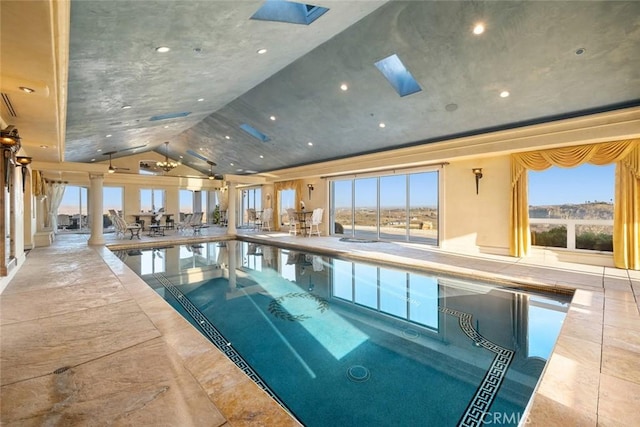 view of pool with a skylight