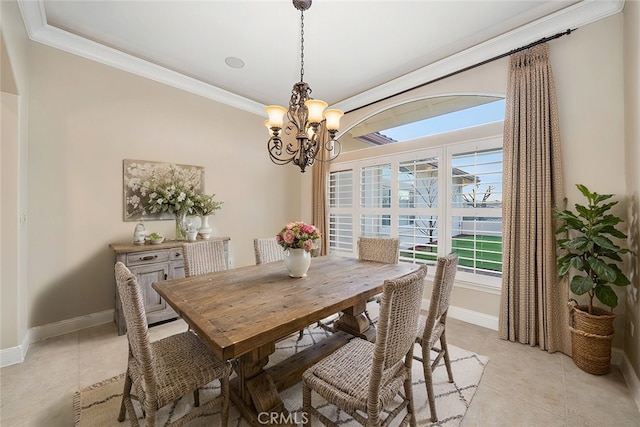 dining area featuring a notable chandelier, light tile patterned floors, and ornamental molding