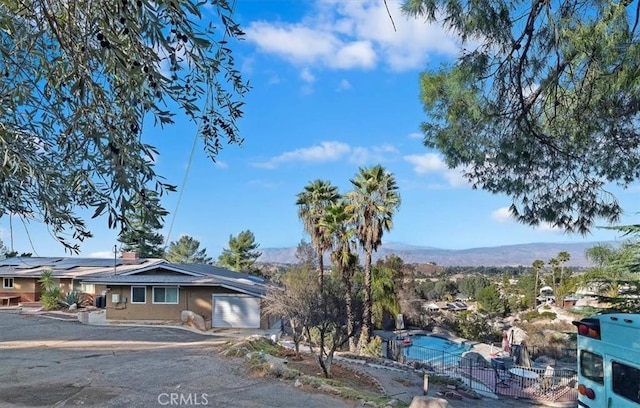 exterior space featuring a mountain view