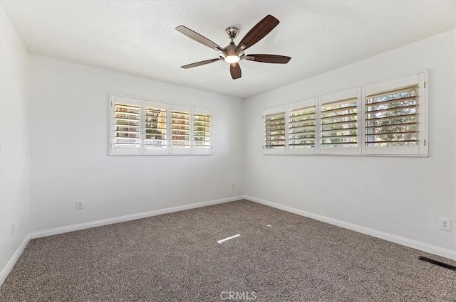 unfurnished room featuring carpet floors and ceiling fan