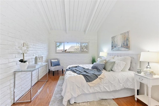 bedroom featuring brick wall, hardwood / wood-style floors, wooden ceiling, and beam ceiling