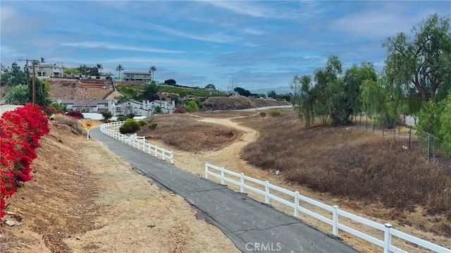 view of road featuring a rural view