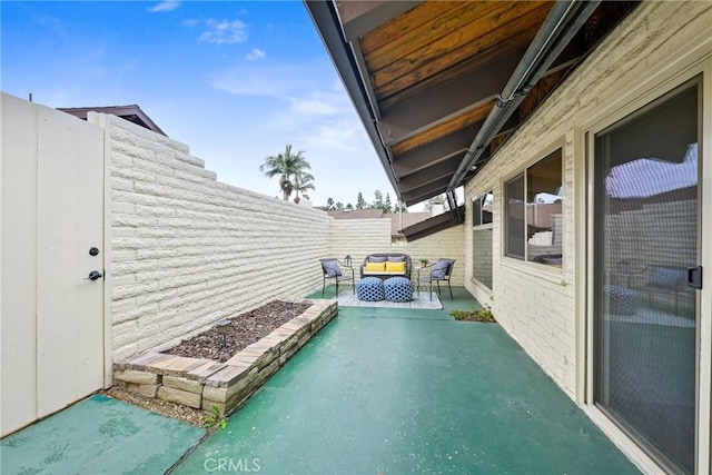 view of pool featuring a patio