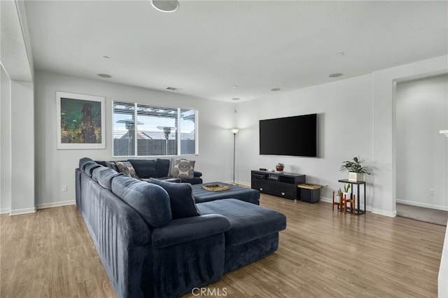 living room with hardwood / wood-style floors