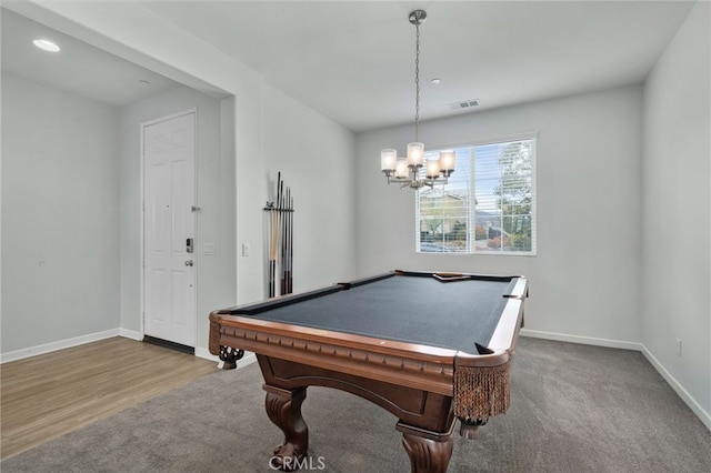 recreation room featuring pool table, carpet floors, and a notable chandelier