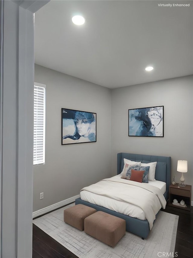 bedroom with wood-type flooring