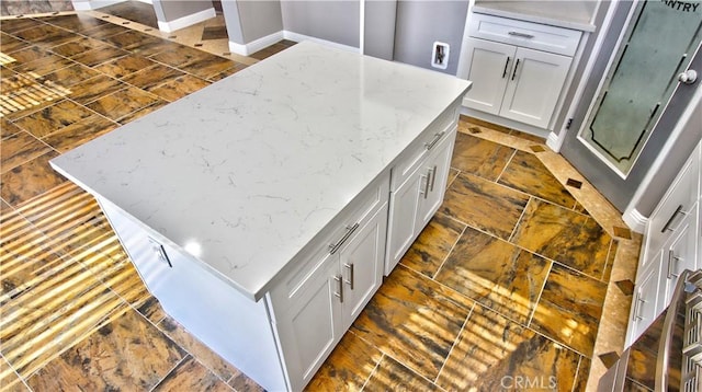 interior space with light stone countertops