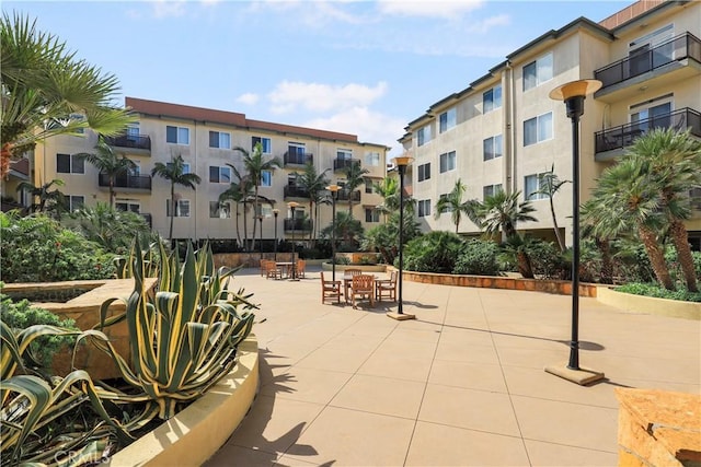 view of community with a patio area