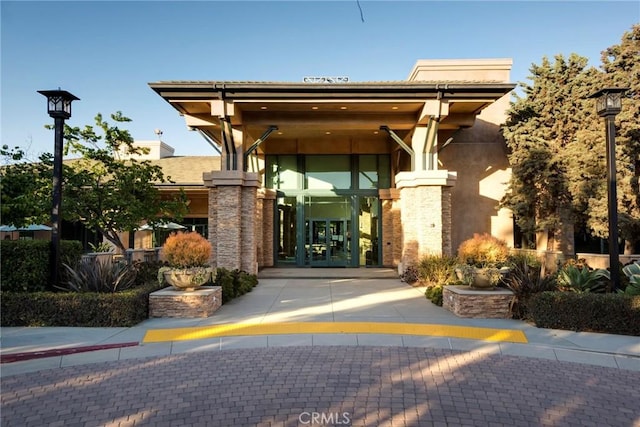 entrance to property featuring french doors