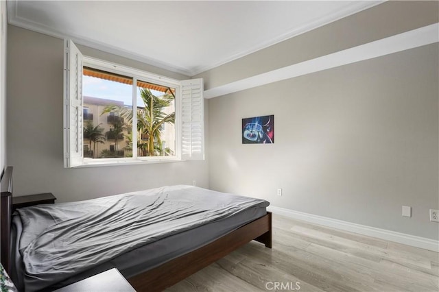 bedroom featuring light hardwood / wood-style flooring