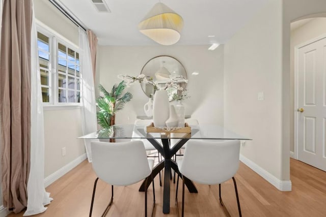 dining room featuring light hardwood / wood-style floors