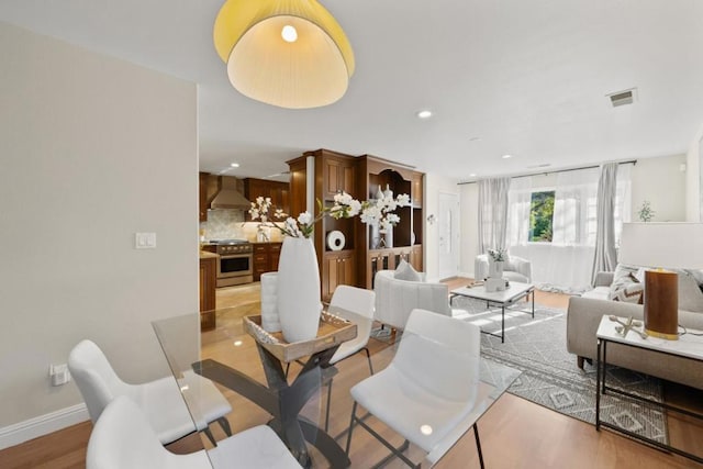 dining area featuring light hardwood / wood-style flooring