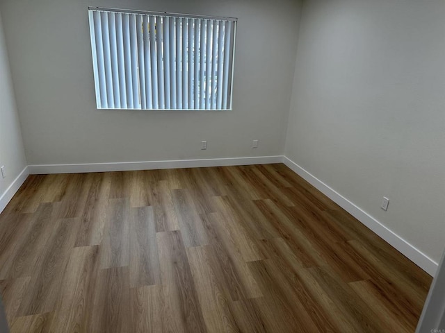 spare room with light wood-type flooring