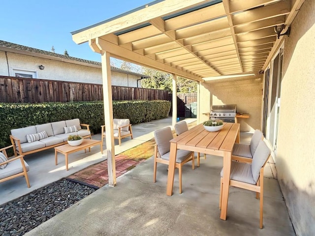 view of patio with an outdoor living space and area for grilling