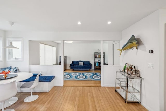 interior space featuring breakfast area and light hardwood / wood-style flooring