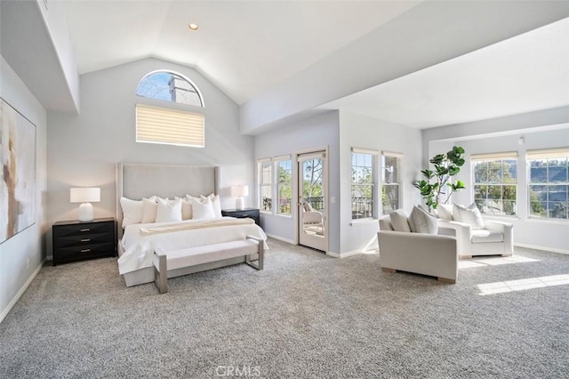 bedroom featuring multiple windows, access to outside, high vaulted ceiling, and carpet