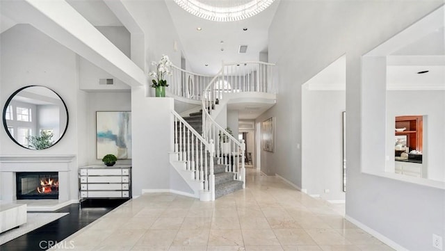 entryway featuring a high ceiling