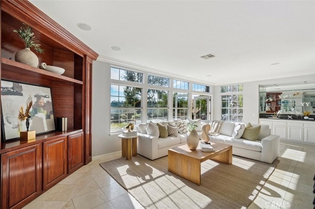 sunroom / solarium featuring plenty of natural light